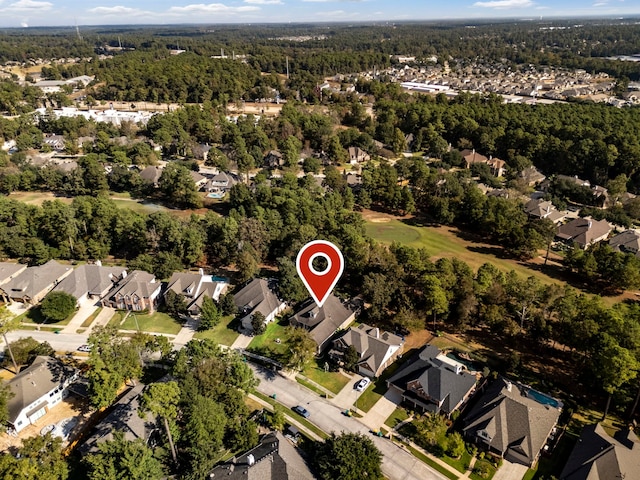 1614 Beau Rivage, Conroe, TX 77304 - view of property location with nearby suburban area and a heavily wooded area