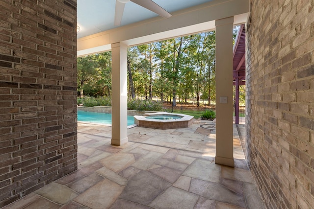 1614 Beau Rivage, Conroe, TX 77304 - view of swimming pool with an in-ground hot tub and a patio area