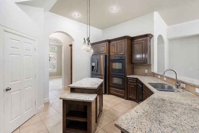 1614 Beau Rivage, Conroe, TX 77304 - kitchen featuring black appliances, a sink, arched walkways, light tile patterned flooring, and open shelves