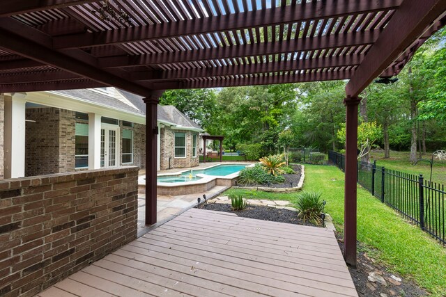 1614 Beau Rivage, Conroe, TX 77304 - wooden deck featuring a pergola, a patio, and a pool with connected hot tub