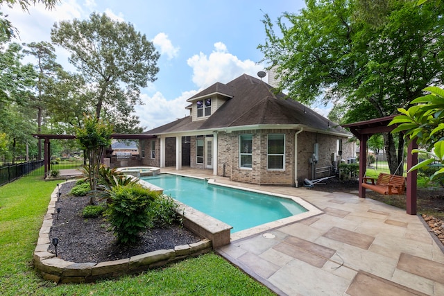1614 Beau Rivage, Conroe, TX 77304 - view of pool with a patio area and a pool with connected hot tub