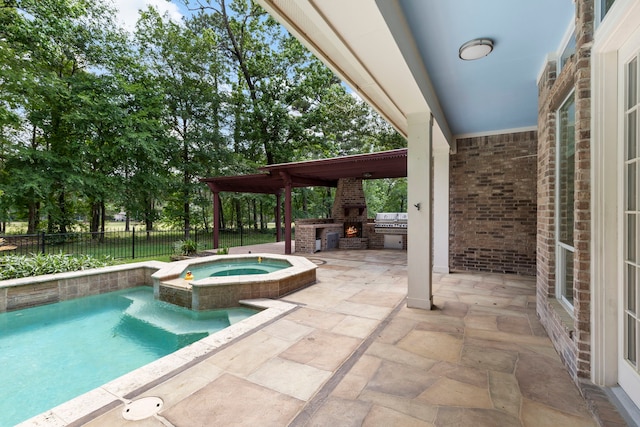 1614 Beau Rivage, Conroe, TX 77304 - view of pool with a patio area, fence, an outdoor stone fireplace, and a pool with connected hot tub