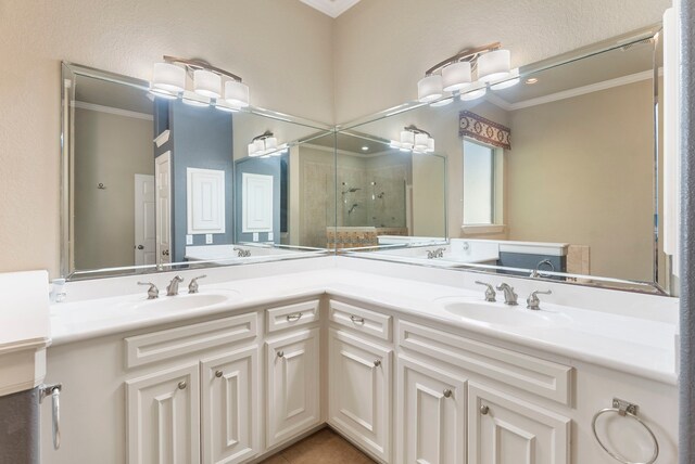 1614 Beau Rivage, Conroe, TX 77304 - bathroom featuring ornamental molding, a shower stall, double vanity, and tile patterned flooring