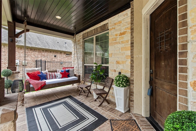 view of patio / terrace featuring fence