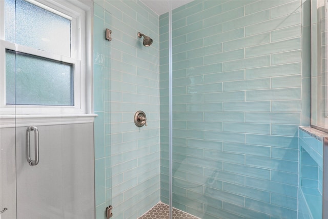 bathroom featuring a shower stall