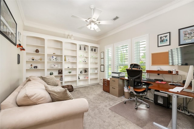 home office featuring ceiling fan, light carpet, ornamental molding, and visible vents
