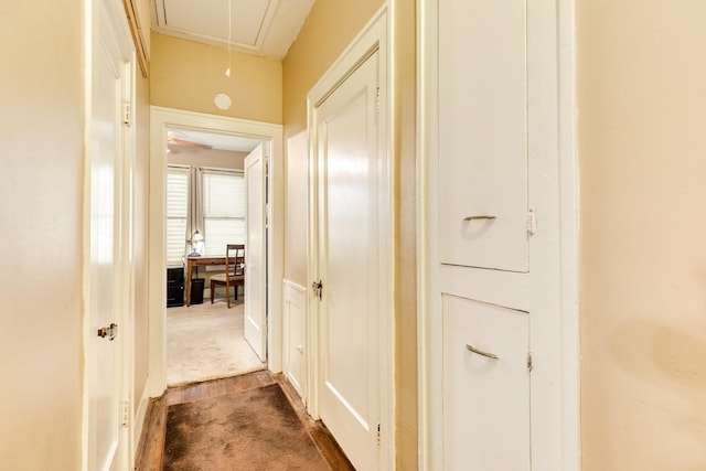hall featuring attic access