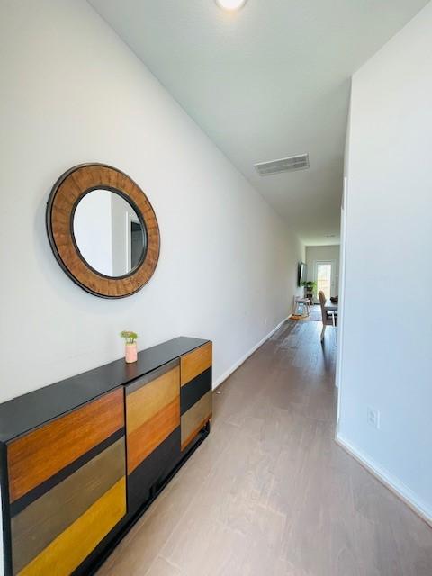 27915 Western Creek Ct, Katy, TX 77494 - hallway with baseboards and visible vents