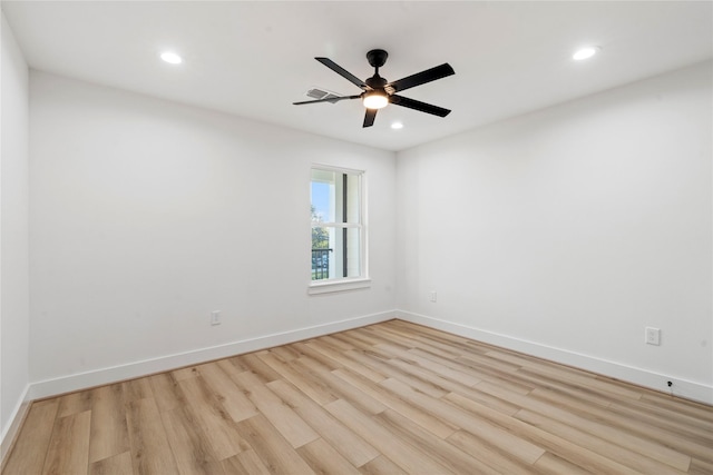 empty room featuring baseboards, recessed lighting, a ceiling fan, and light wood-style flooring