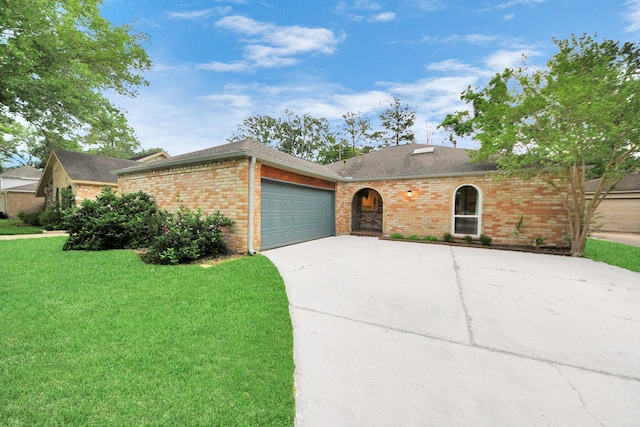 view of front of house featuring roof with shingles, a front lawn, brick siding, a garage, and concrete driveway
