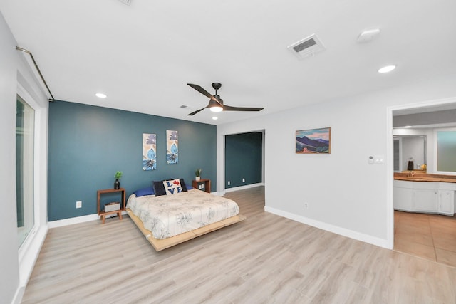 bedroom featuring visible vents, light wood-style floors, baseboards, recessed lighting, and a ceiling fan