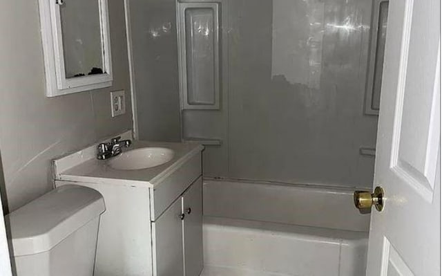 bathroom featuring shower / bath combination and vanity