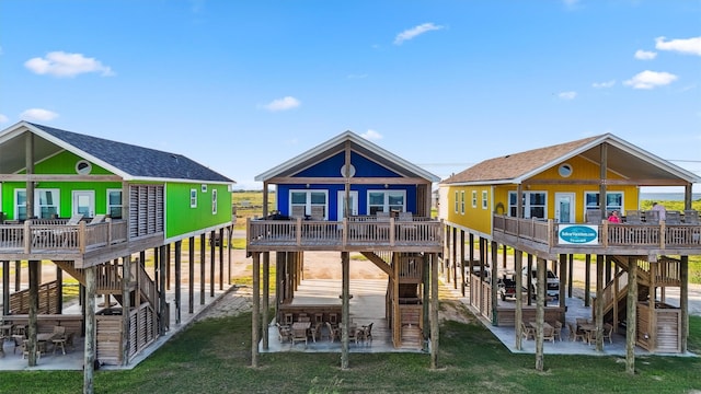 exterior space with a lawn and a deck