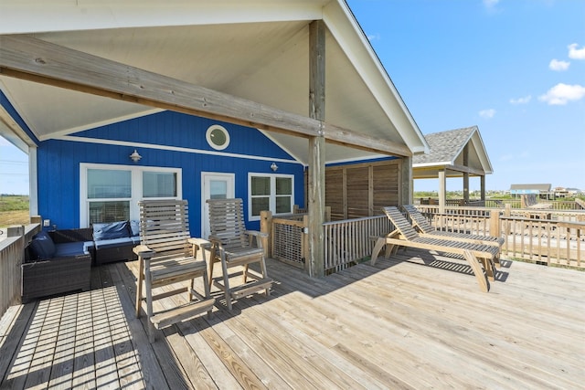 deck with an outdoor hangout area