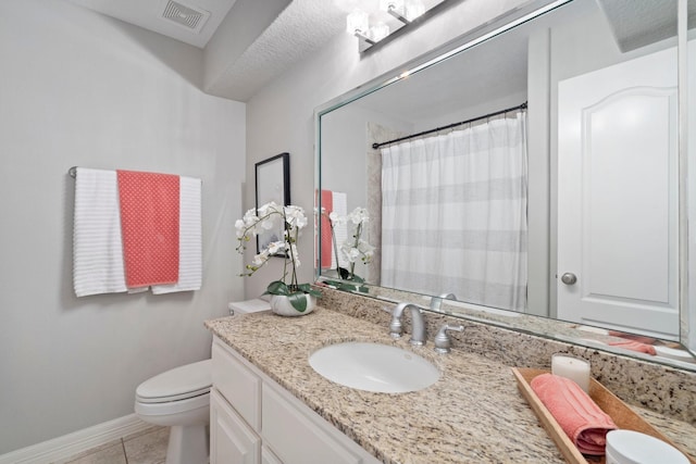 bathroom with visible vents, tile patterned flooring, curtained shower, vanity, and toilet