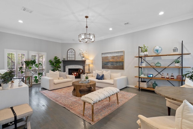 living room with recessed lighting, dark wood finished floors, and visible vents