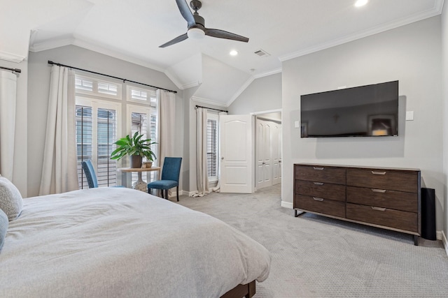 bedroom featuring baseboards, visible vents, light carpet, and lofted ceiling