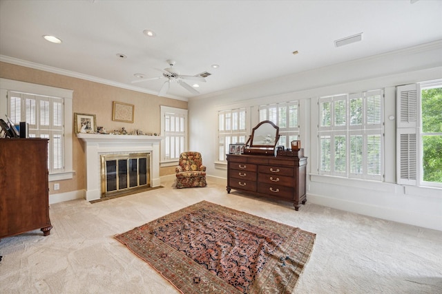 bedroom featuring recessed lighting, carpet flooring, a fireplace with flush hearth, visible vents, and ornamental molding