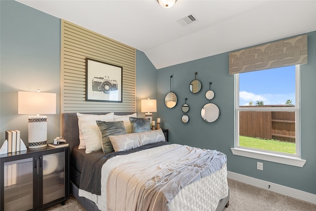 154 W Coralburst Loop, Montgomery, TX 77316 - carpeted bedroom with baseboards, multiple windows, lofted ceiling, and visible vents