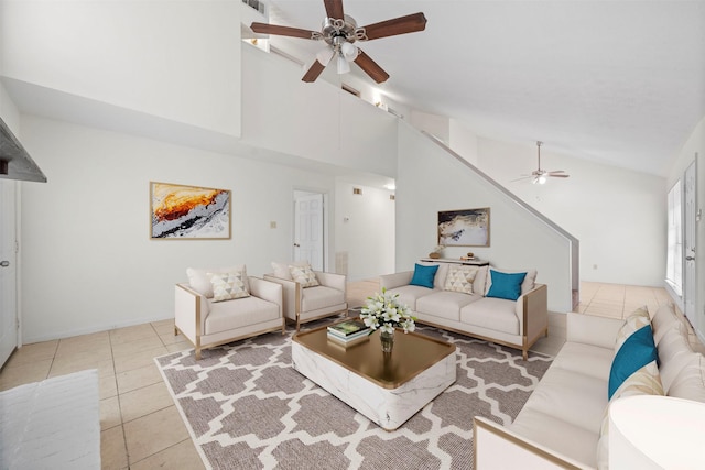 living area featuring tile patterned flooring, high vaulted ceiling, and ceiling fan