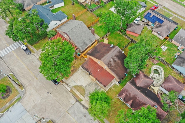 birds eye view of property with a residential view