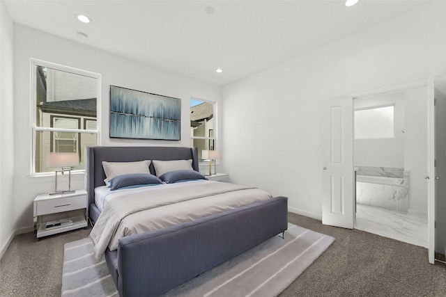 bedroom with baseboards, carpet floors, and multiple windows