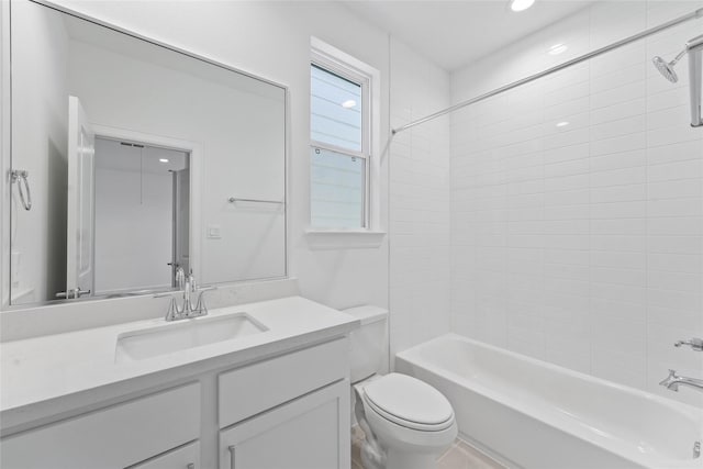 bathroom with tub / shower combination, recessed lighting, vanity, and toilet