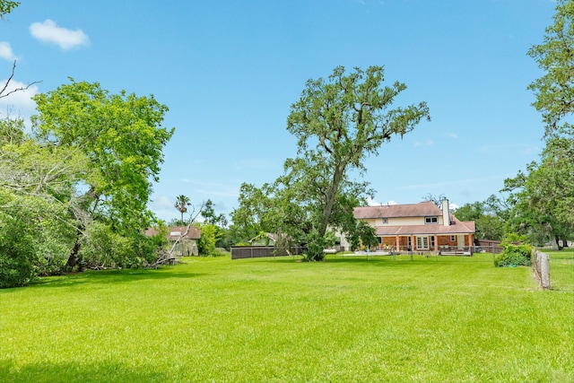 view of yard featuring fence