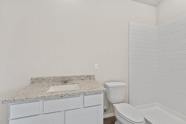 8685 Sassafras St, Willis, TX 77318 - full bath with tiled shower, baseboards, vanity, and toilet