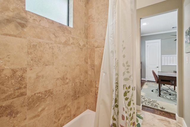full bathroom featuring baseboards, ornamental molding, and shower / tub combo with curtain