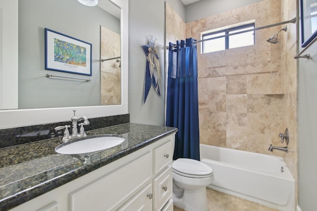 full bathroom featuring tile patterned flooring, shower / tub combo with curtain, toilet, and vanity