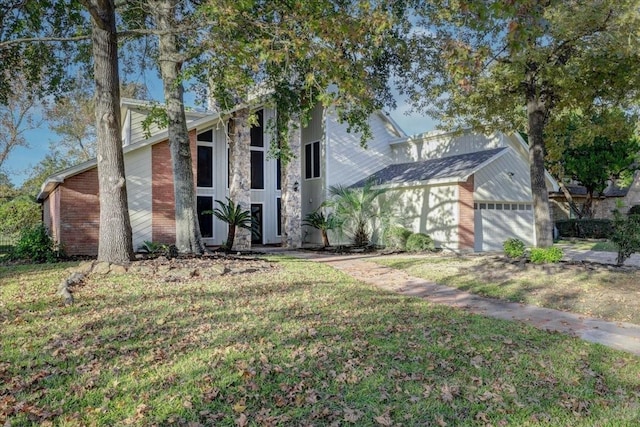 8407 Rebawood Dr, Humble, TX 77346 - mid-century home featuring a front yard and an attached garage