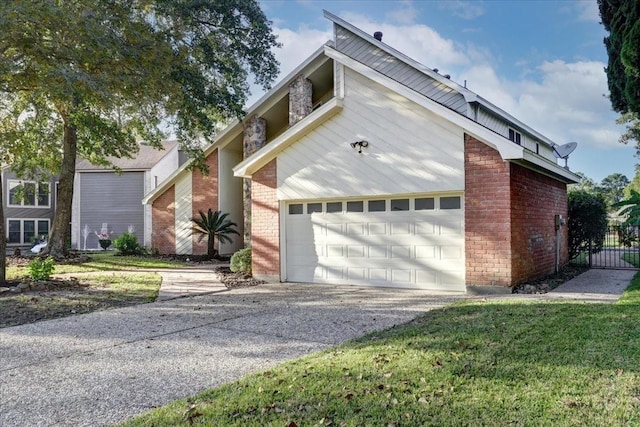 view of side of home featuring gravel driveway, brick siding, and a garage