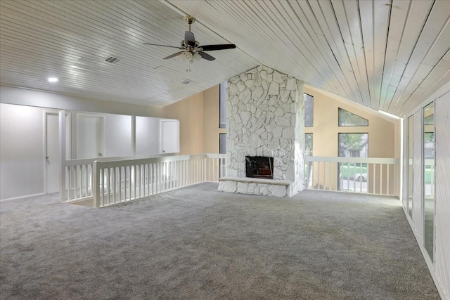 8407 Rebawood Dr, Humble, TX 77346 - unfurnished living room with ceiling fan, carpet floors, vaulted ceiling, a fireplace, and wooden ceiling