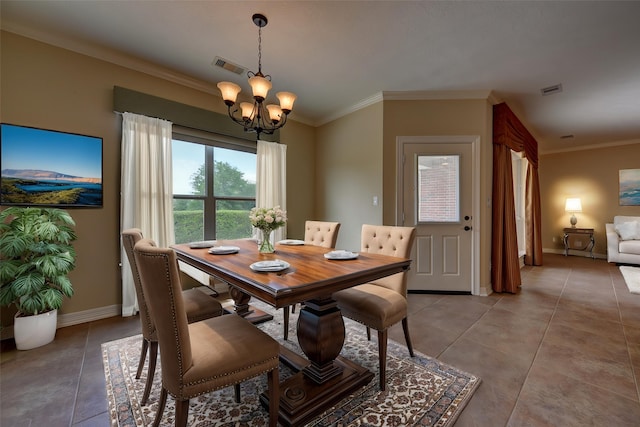 dining space with light tile patterned flooring, baseboards, visible vents, an inviting chandelier, and ornamental molding