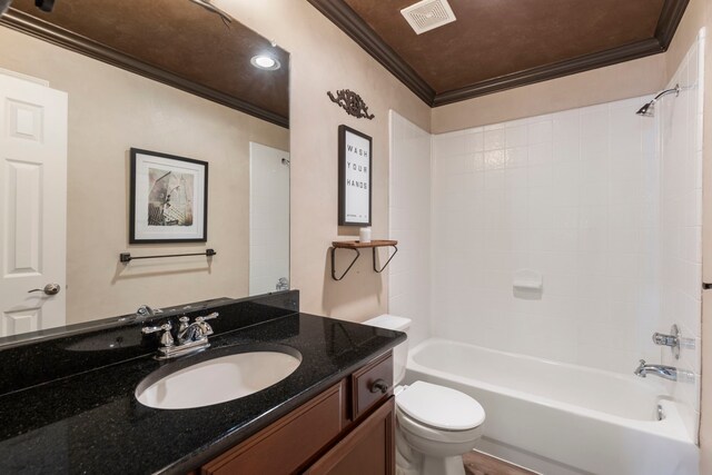 full bath featuring crown molding, toilet, visible vents, and vanity
