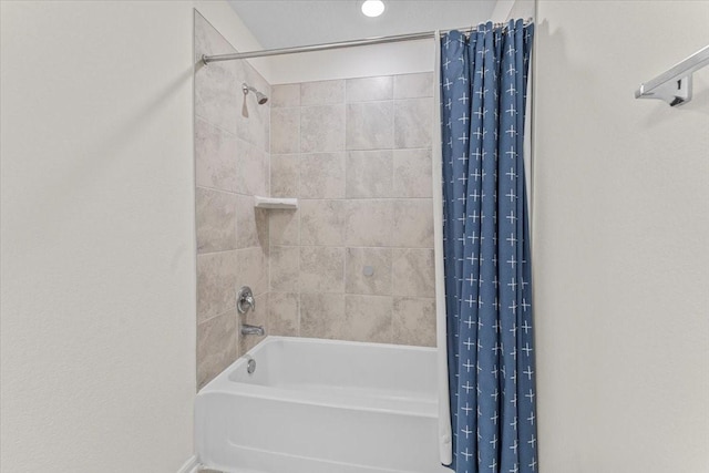 8804 Ute Creek Ln, Magnolia, TX 77354 - bathroom featuring shower / bath combination with curtain