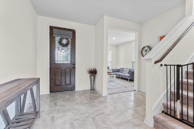 8804 Ute Creek Ln, Magnolia, TX 77354 - entryway with baseboards and stairway