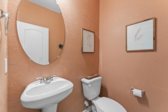 8804 Ute Creek Ln, Magnolia, TX 77354 - bathroom featuring toilet and a sink