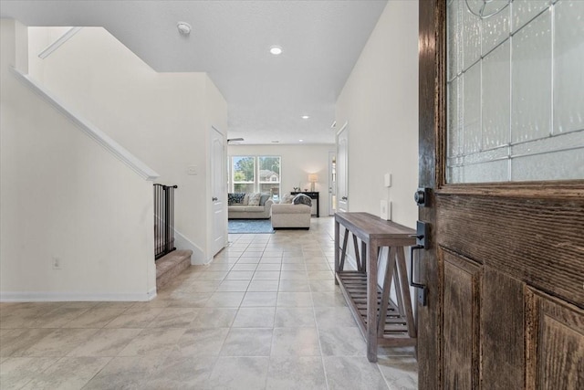 8804 Ute Creek Ln, Magnolia, TX 77354 - entrance foyer with baseboards, recessed lighting, stairs, and light tile patterned flooring