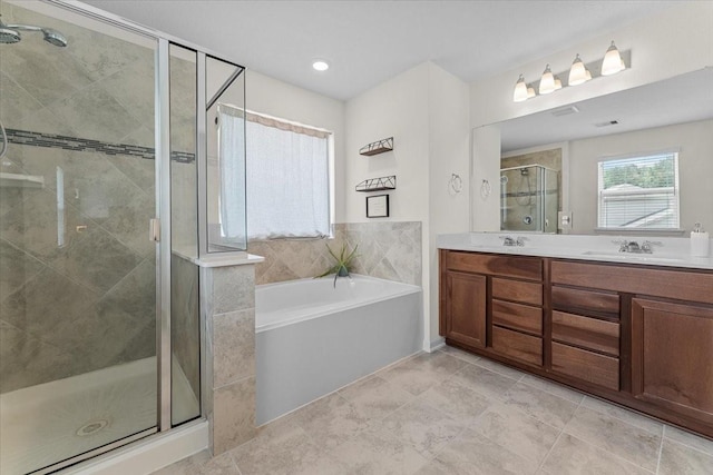 8804 Ute Creek Ln, Magnolia, TX 77354 - bathroom with a bath, a stall shower, double vanity, and a sink