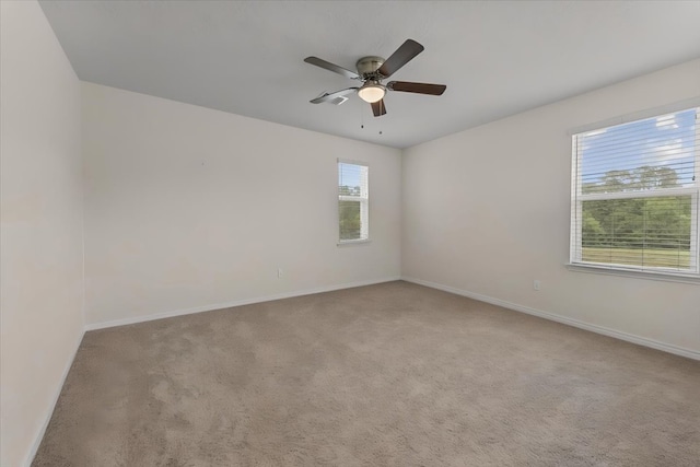 8804 Ute Creek Ln, Magnolia, TX 77354 - carpeted spare room with a ceiling fan and baseboards
