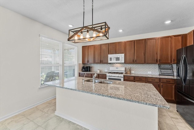 8804 Ute Creek Ln, Magnolia, TX 77354 - kitchen featuring light tile patterned floors, tasteful backsplash, a sink, an inviting chandelier, and white appliances