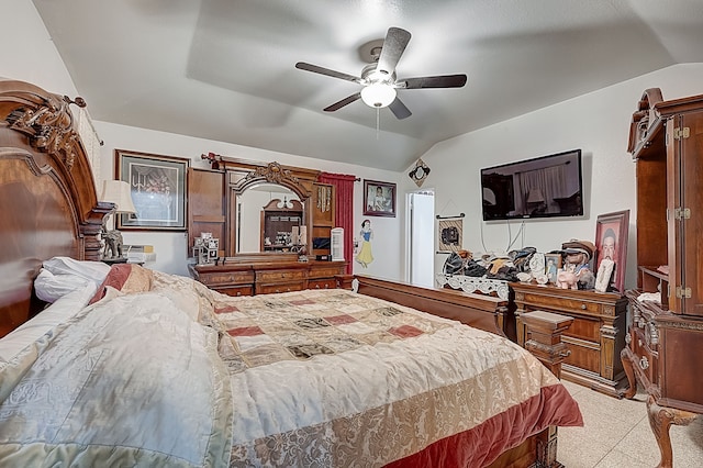 bedroom featuring vaulted ceiling and a ceiling fan