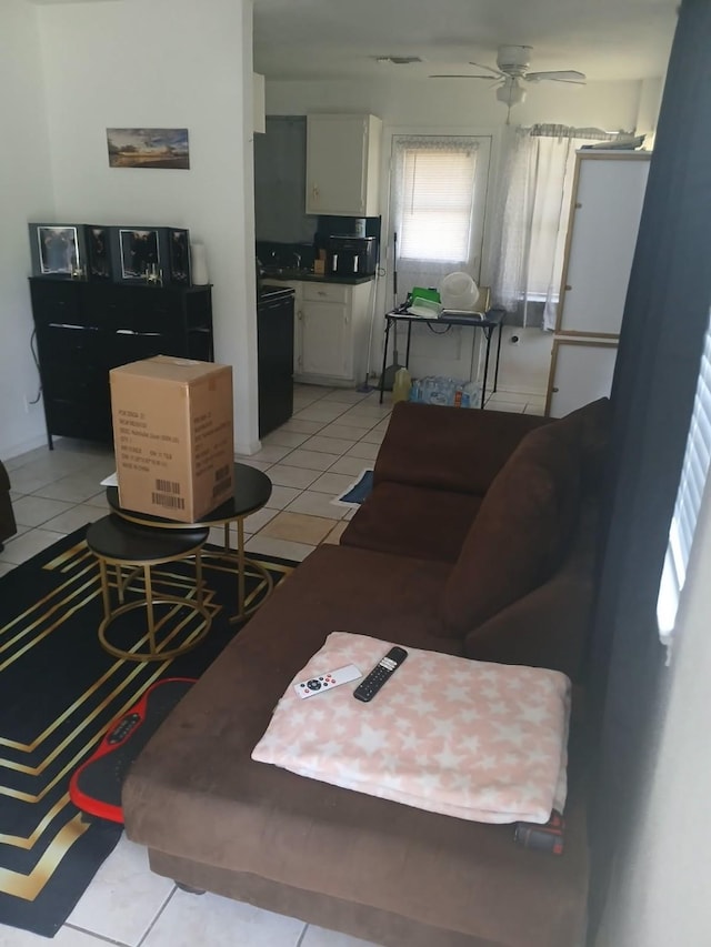 2602 Dalview St, Houston, TX 77091 - living room with ceiling fan and light tile patterned floors