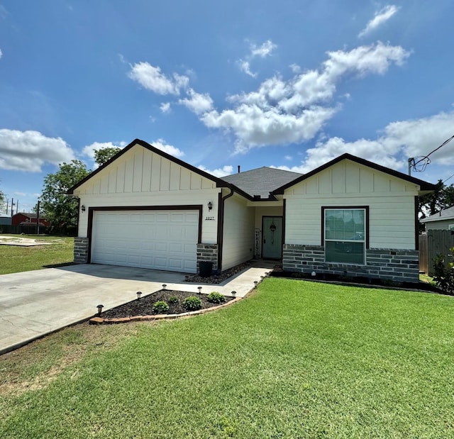 ranch-style home featuring driveway, a garage, a shingled roof, board and batten siding, and a front yard