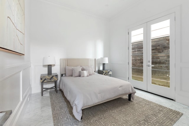bedroom with marble finish floor, access to outside, ornamental molding, and french doors
