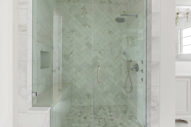bathroom featuring a stall shower