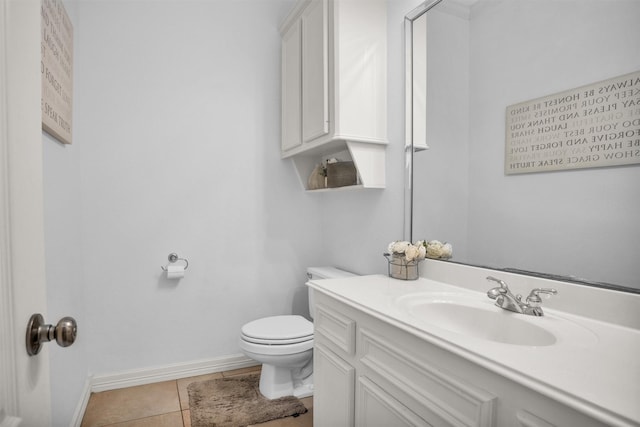 11409 E Zoe Loop Dr, Montgomery, TX 77316 - half bath with toilet, baseboards, vanity, and tile patterned flooring