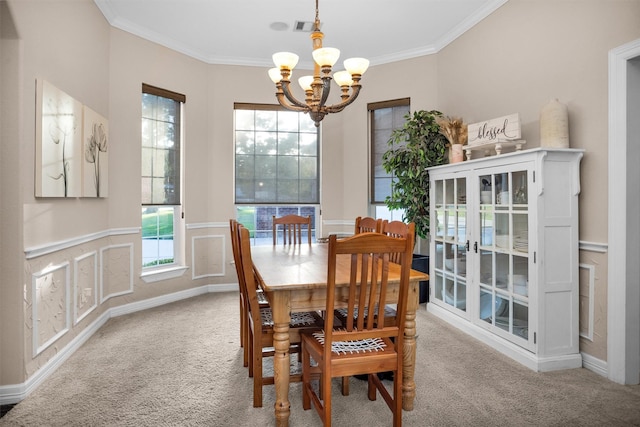 11409 E Zoe Loop Dr, Montgomery, TX 77316 - carpeted dining room featuring a chandelier and crown molding